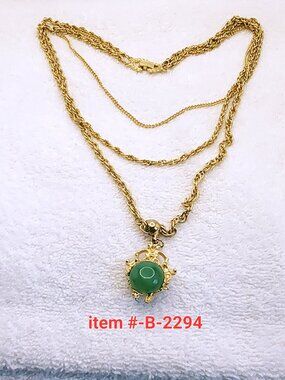 1 Gold 3 chain necklace w/green/white stone pendant , item # B2294, wt.69 grams.